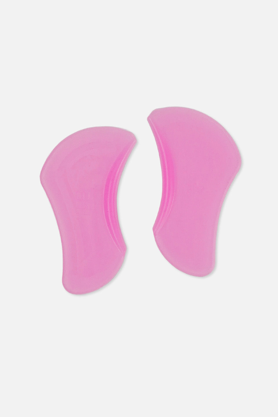 Coppia di bigodini piatti fucsia in silicone per laminazione ciglia coreana senza colla, disposti verticalmente su sfondo bianco neutro.