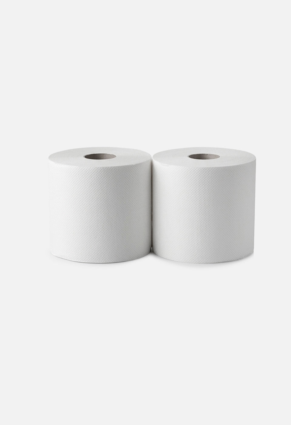 Due grandi bobine industriali di carta bianca goffrata disposte una accanto all'altra, con anima in cartone grigio visibile, viste di fronte