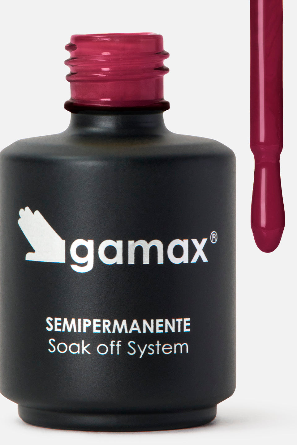 Flacone nero con logo gamax argentato e scritta "semipermanente soak off system" aperto con pennello accanto nel collo del flacone e sul pennello si vede il colore dello smalto: rosso porpora