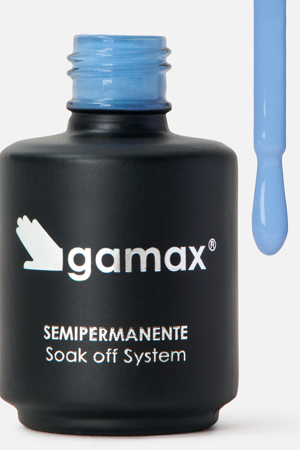 primo piano flacone e pennello dello smalto semipermanente azzurro ninfee