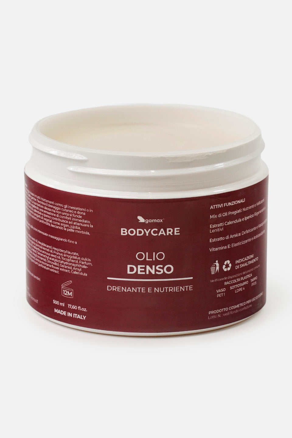 Inquadratura angolata di Olio Denso Gamax Bodycare aperto, che mostra sia l'etichetta bordeaux che la consistenza del prodotto all'interno.