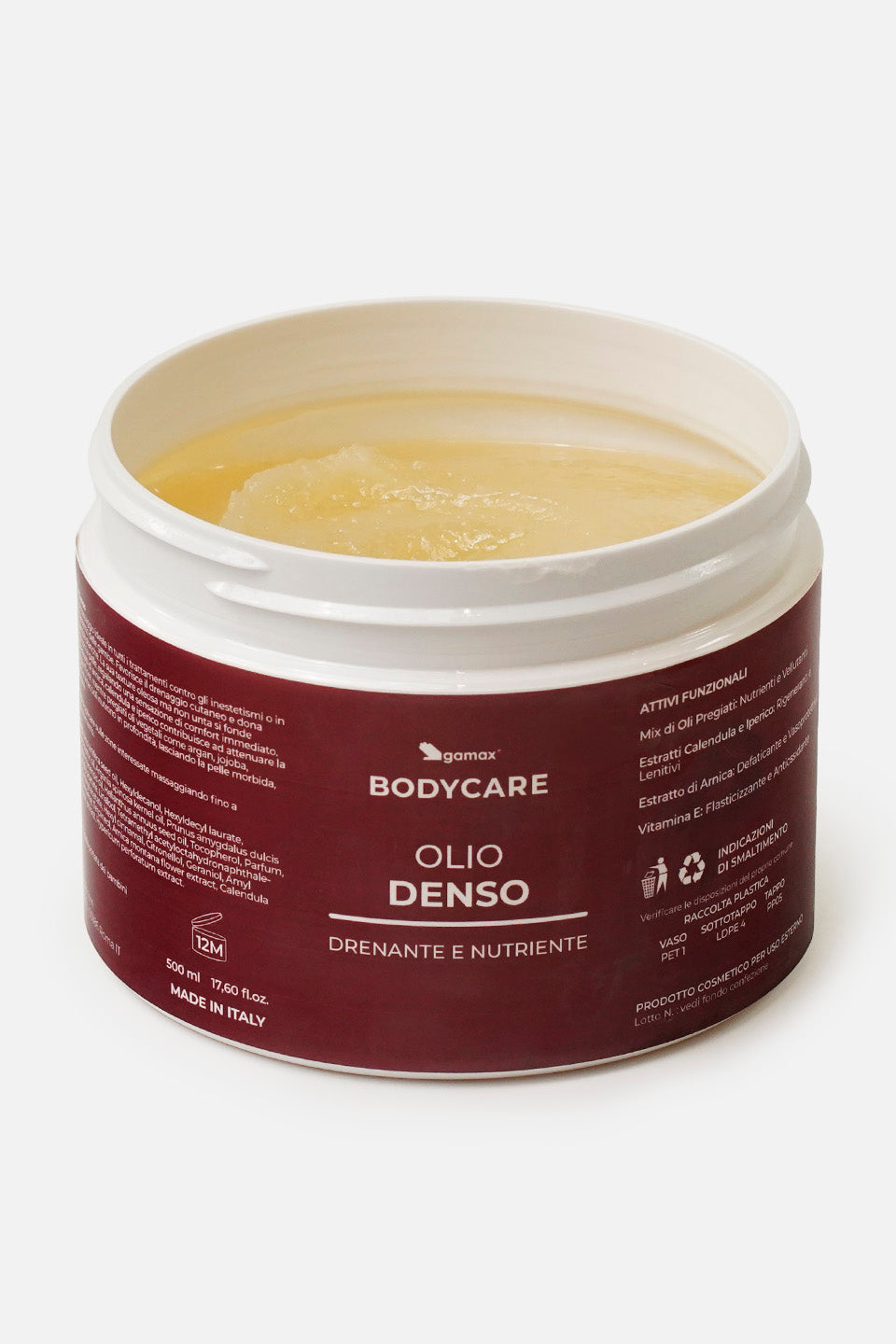 Confezione aperta di Olio Denso Gamax Bodycare vista dall'alto, che mostra il prodotto cremoso e dorato all'interno