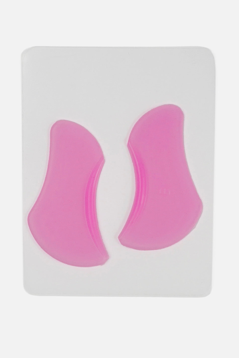 Coppia di bigodini piatti fucsia in silicone ad alta aderenza per il primo step della laminazione coreana, presentati sul loro supporto protettivo trasparente.