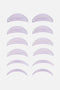 Sei paia di bigodini curvi viola per laminazione ciglia coreana, ordinati per dimensione decrescente, mostrando la forma anatomica e la colorazione viola tenue.
