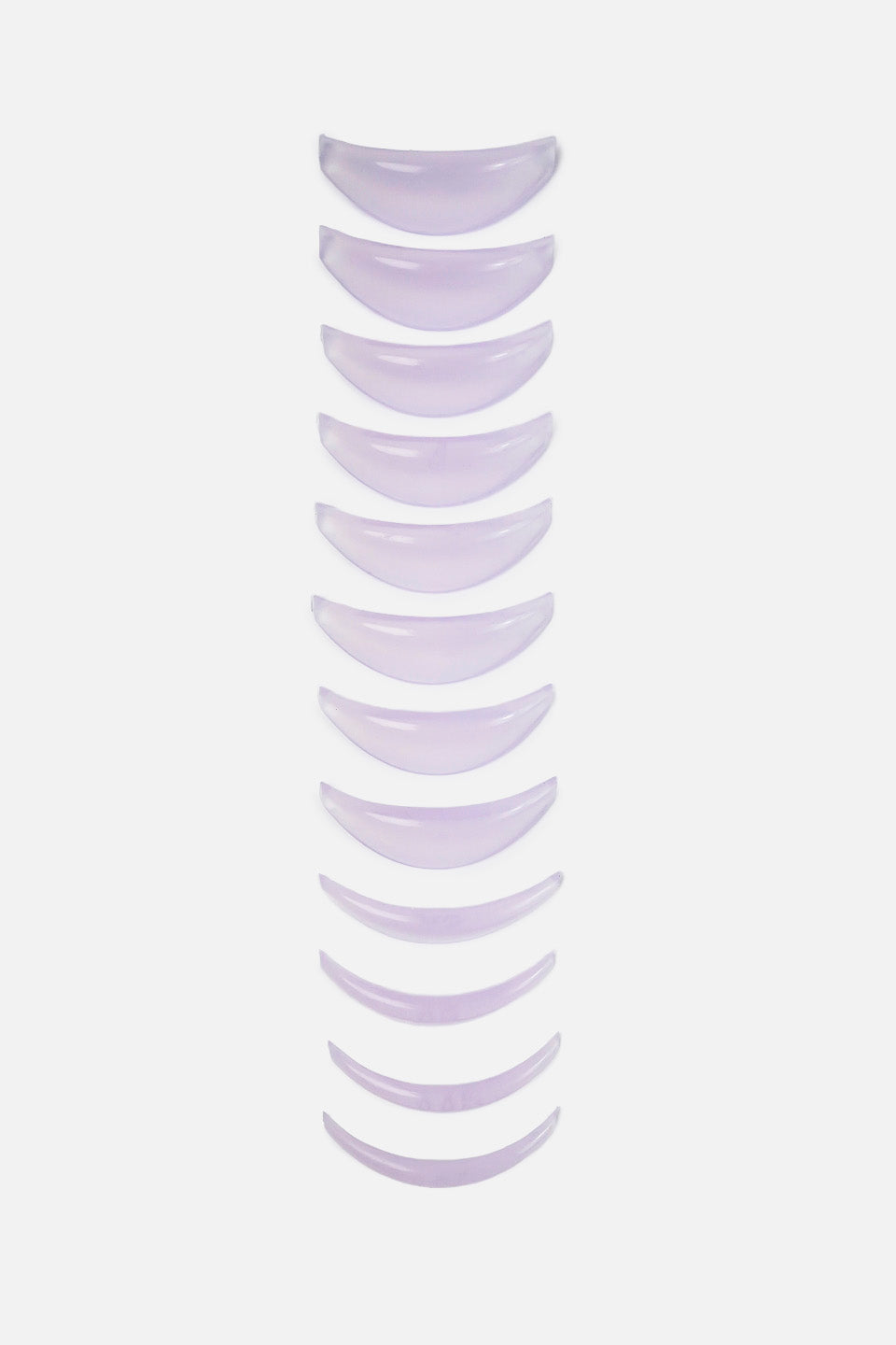 Sei paia di bigodini curvi viola per laminazione ciglia coreana, esposti in ordine decrescente di dimensione per mostrare le varie curvature disponibili.