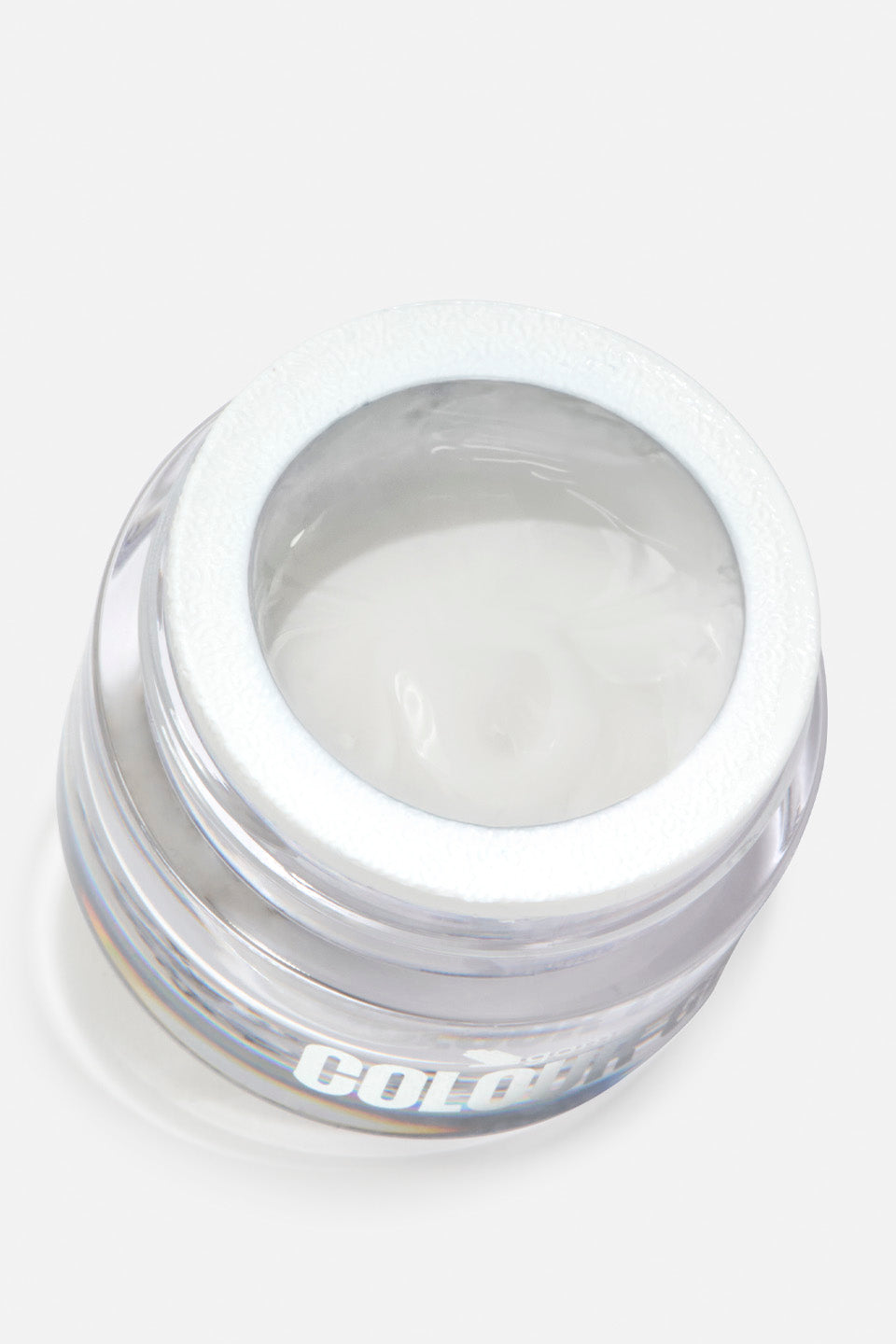 Vista dall'alto di un barattolino circolare e trasparente con dettagli olografici, riempito di spider gel bianco lucido e omogeneo. Il vasetto è aperto, mostrando la superficie morbida del prodotto pronta all'uso su uno sfondo bianco pulito.