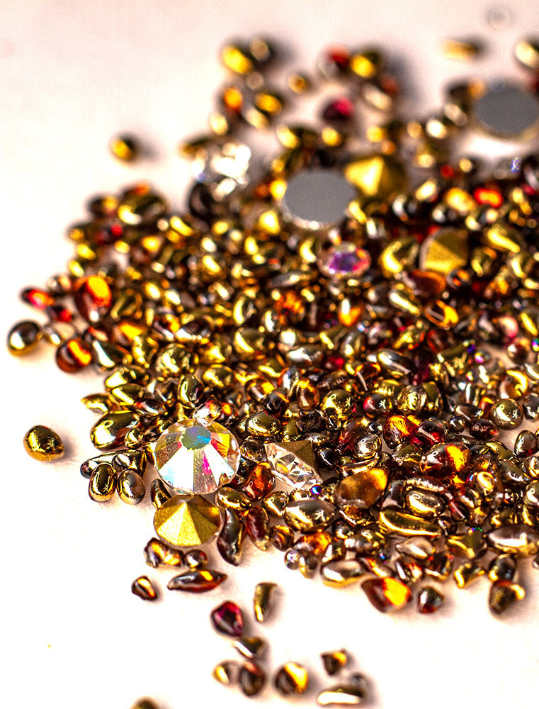 Brillantini e gioielli per unghie oro