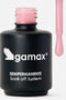 Un flacone di smalto semipermanente gamax. Accanto al flacone aperto, il pennellino mostra una goccia di smalto color rosa chiaro chiffon.