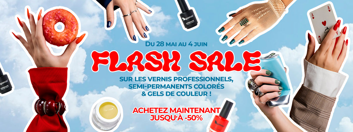 Bannière publicitaire horizontale sur fond de ciel nuageux. Au centre, l'inscription rouge "FLASH SALE" indique une offre du 28 mai au 4 juin avec des réductions jusqu'à -50% sur les vernis professionnels, semi-permanents et gels de couleur. Autour du texte, plusieurs mains affichent des ongles colorés (orange, bleu, vert, rouge) à côté de flacons de vernis Gamax, d'un pot de gel, d'un donut et d'une canette