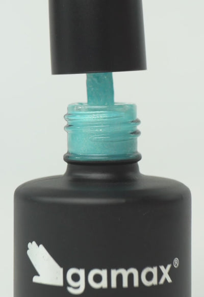 video che mostra dettaglio ravvicinato di texture, pennello e applicazione smalto semipermanente colore celeste glitter