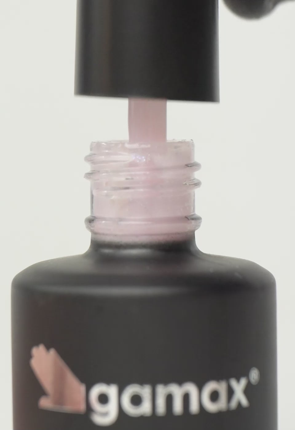 Video in cui si mostra la textutre e la stesura del top coat rosa iridescente