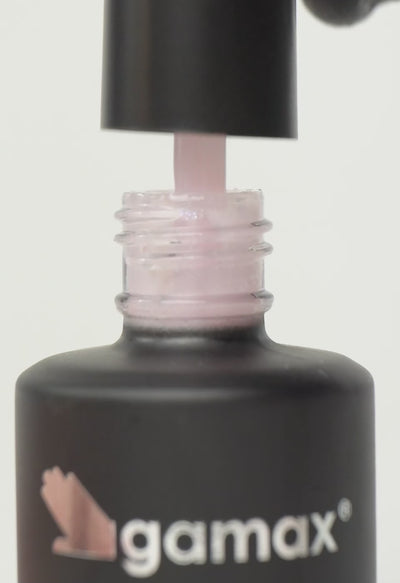 Video in cui si mostra la textutre e la stesura del top coat rosa iridescente