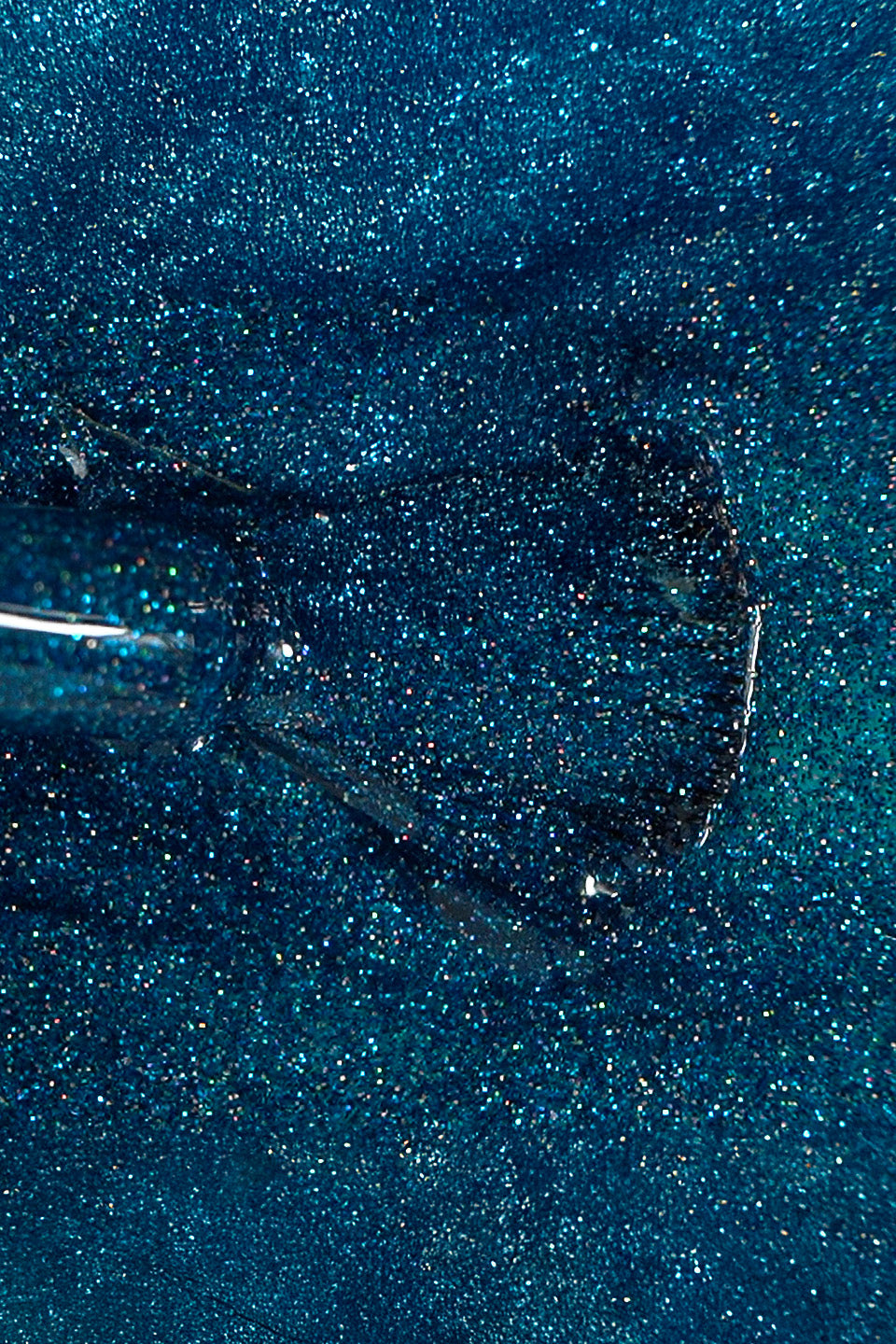 Texture glitterata dello smalto semipermanente Fizzy Blue di Gamax