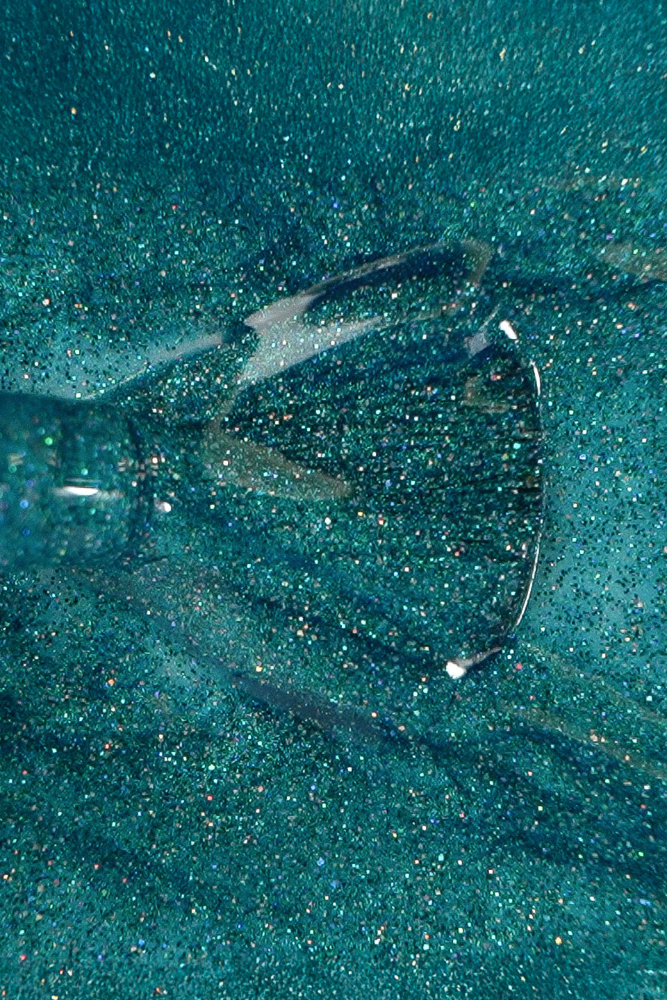 Texture glitterata dello smalto semipermanente Cool Mint di Gamax